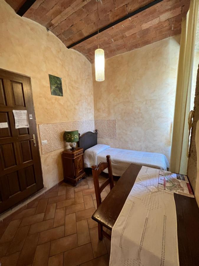 Affittacamere Licenza N.1 Presso La Magica Torre Pitigliano Bagian luar foto